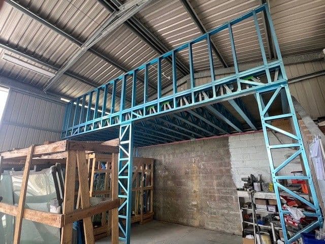 Light gauge steel mezzanine storage platform in a workshop